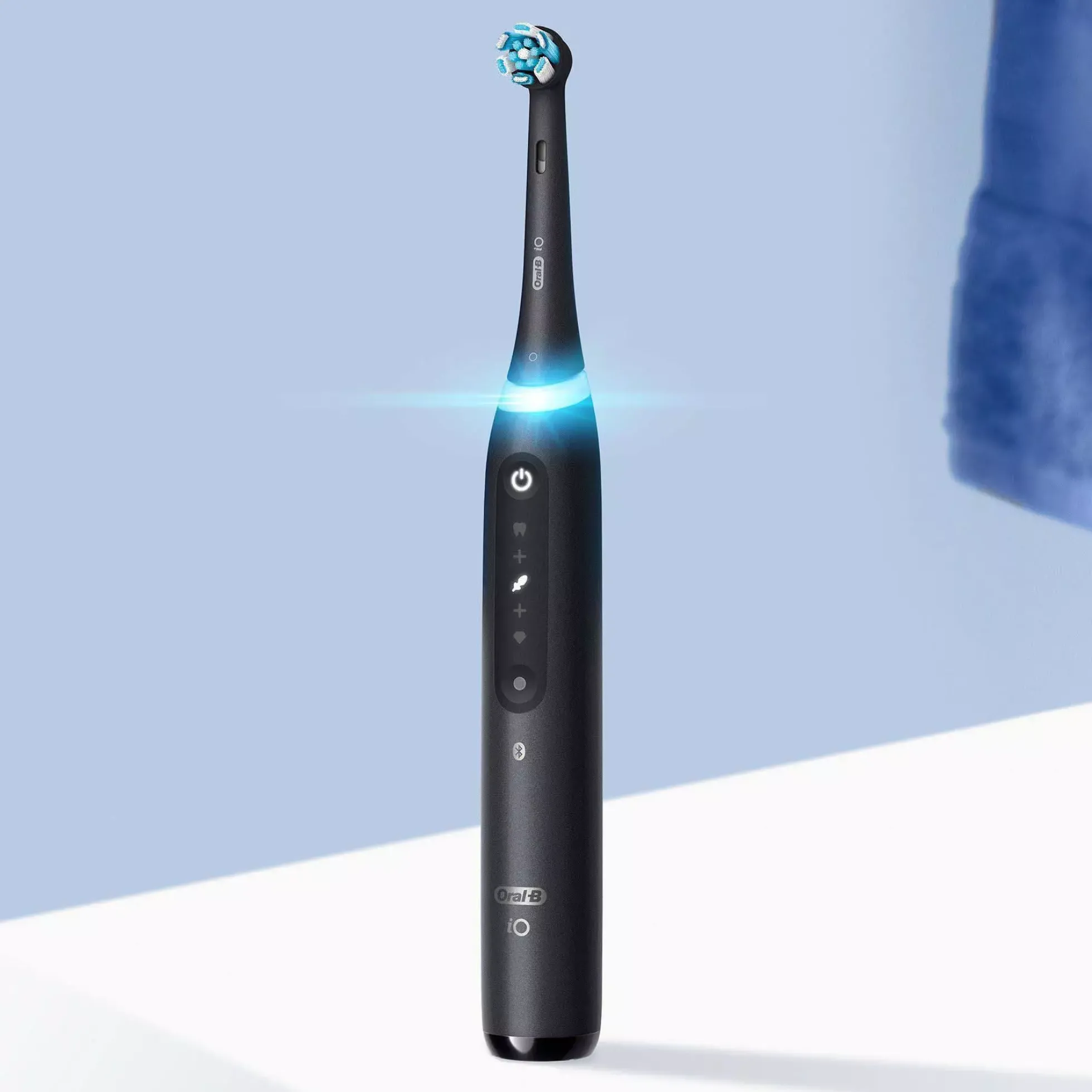 Oral B iO 5 black and white electric toothbrushes Designed by Braun